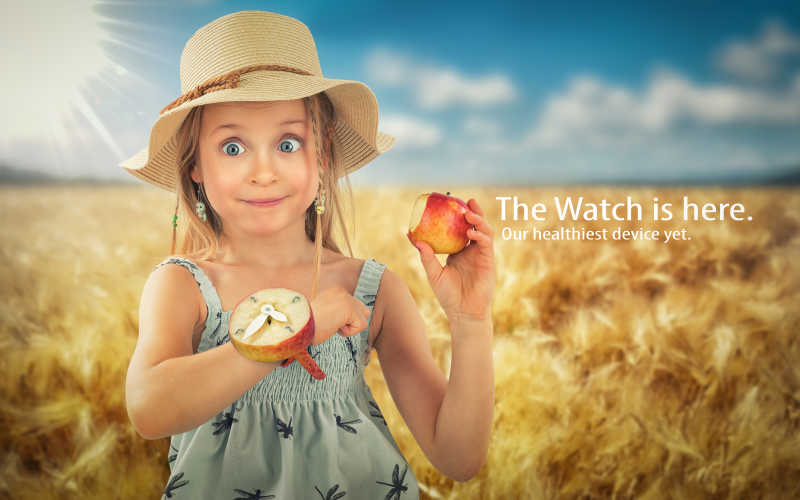 小女孩吃着苹果以及手腕上的苹果手表特写