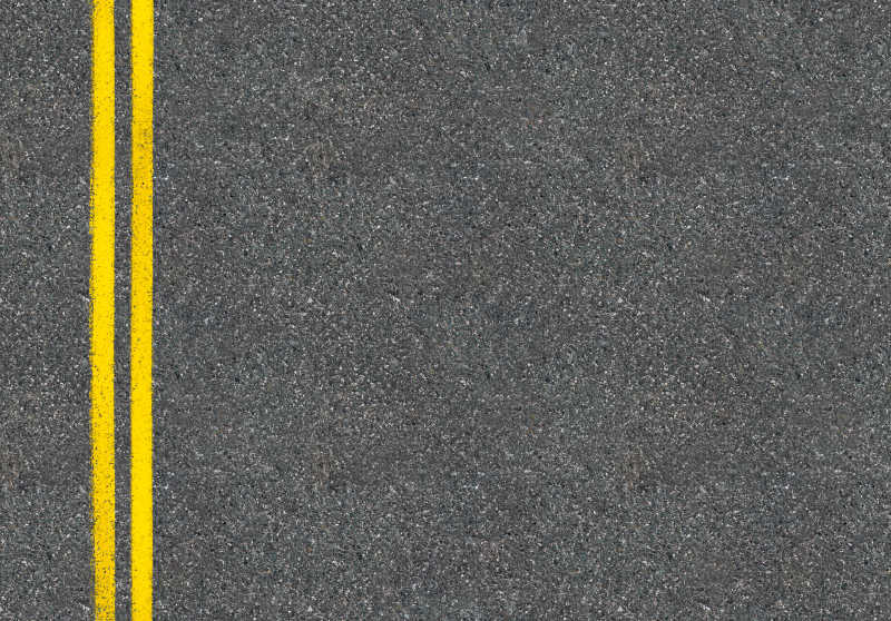 沥青路上的两条黄色标线俯视图