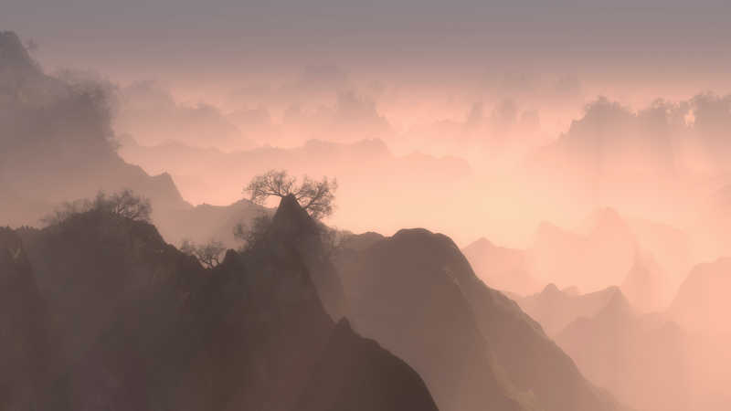薄雾笼罩的山林山峰