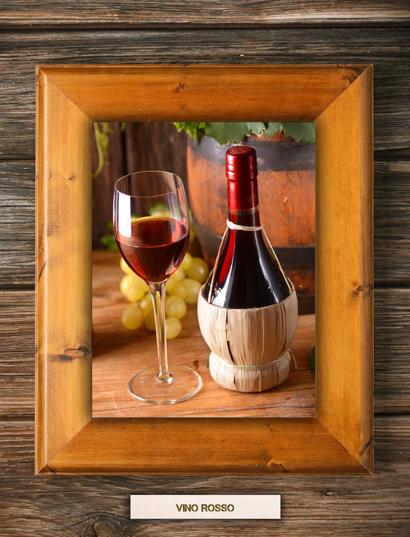 带有一瓶葡萄酒和一杯盛满葡萄酒的酒杯相框