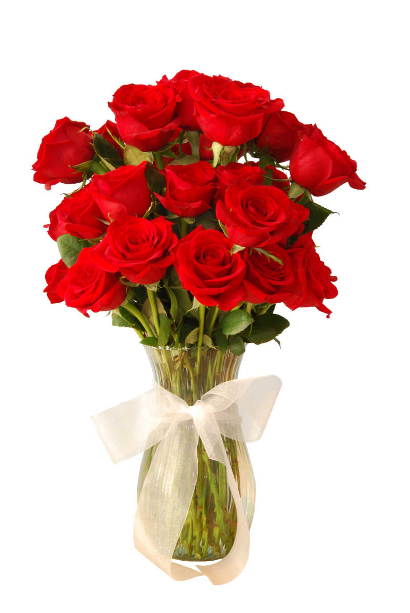 花瓶里的美丽的盛开的红玫瑰