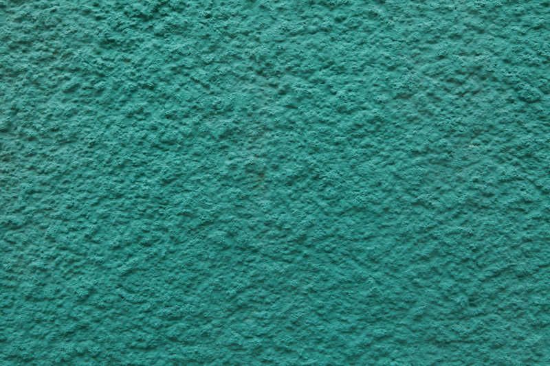 混凝土制作的墙上涂上了翠绿色油漆