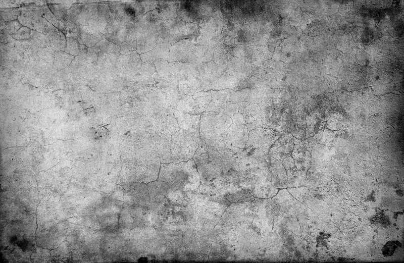 黑灰色带有裂缝的水泥墙面背景