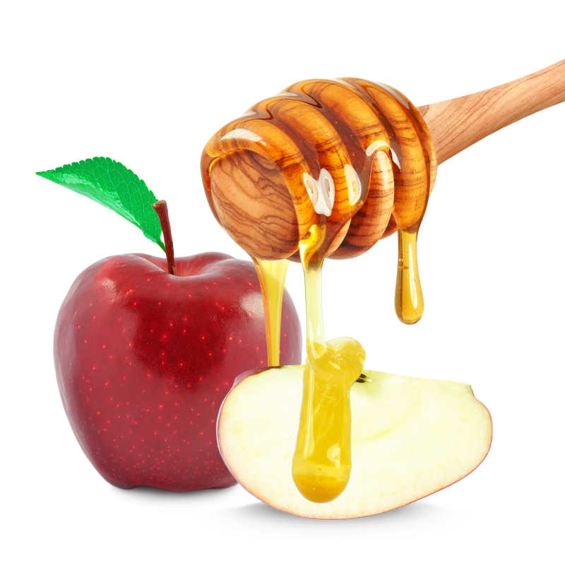 白色背景下的苹果和蜂蜜