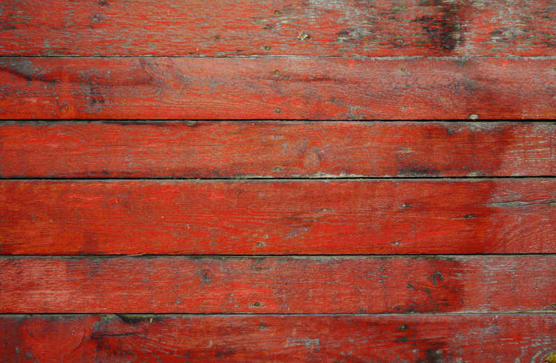 涂有红色油漆的木制木板