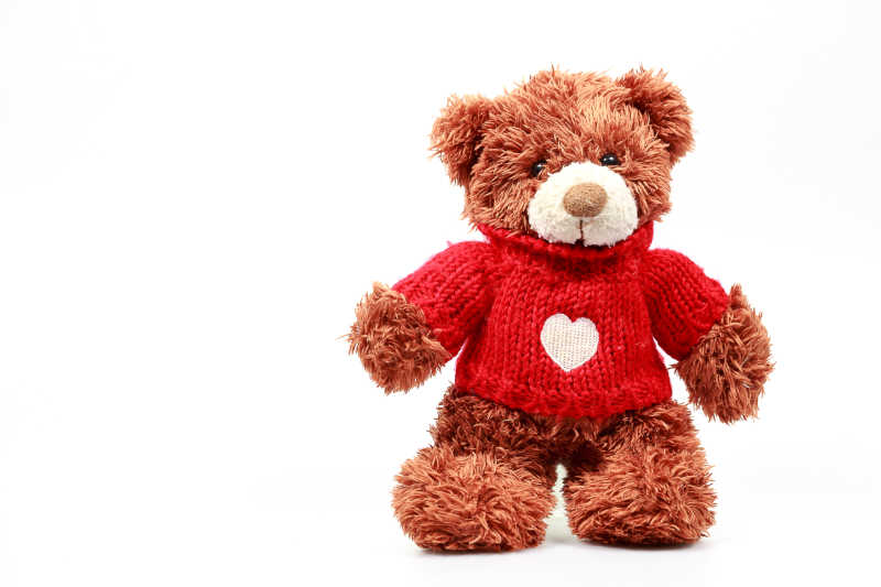 穿着红色衣服的泰迪熊玩偶