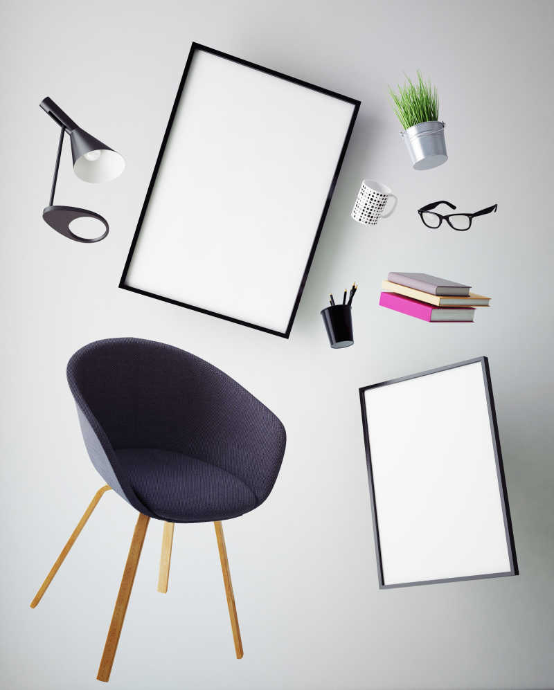 空白海报椅子眼镜和各种学习用品特写