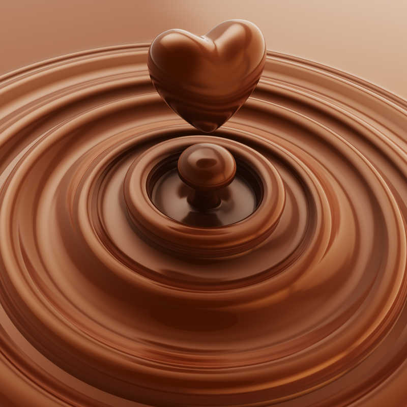 黑巧克力心形符号作为液滴