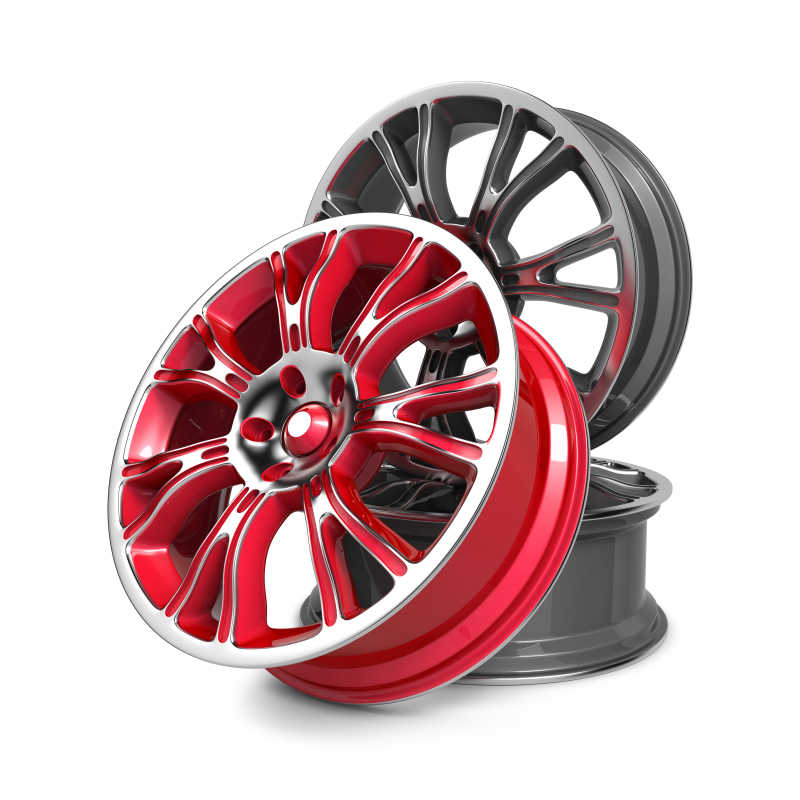 白色背景下红色和灰色的汽车轮胎钢圈