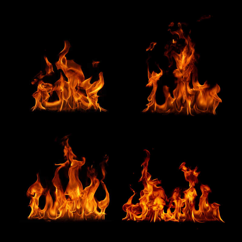 黑色背景下燃烧的四组火焰