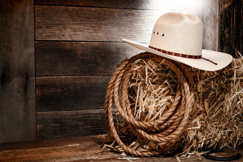 美国西部牛仔的帽子和传统牧场绳