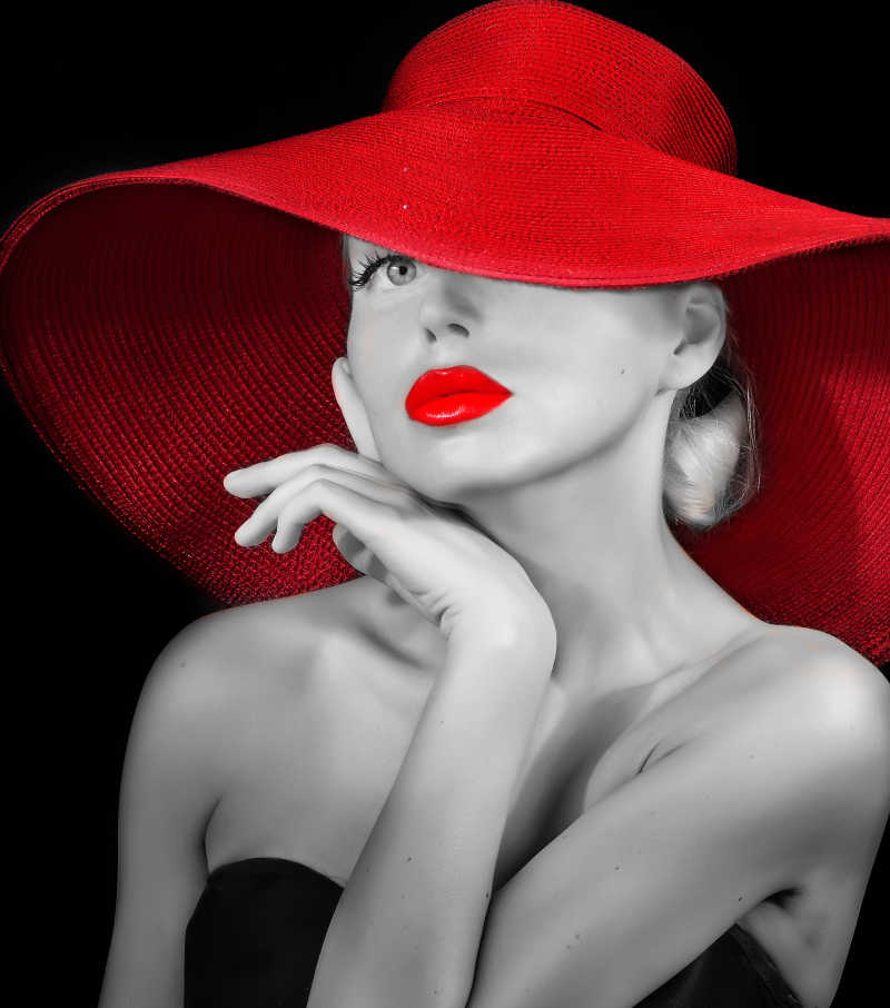 漂亮女孩戴着红色帽子