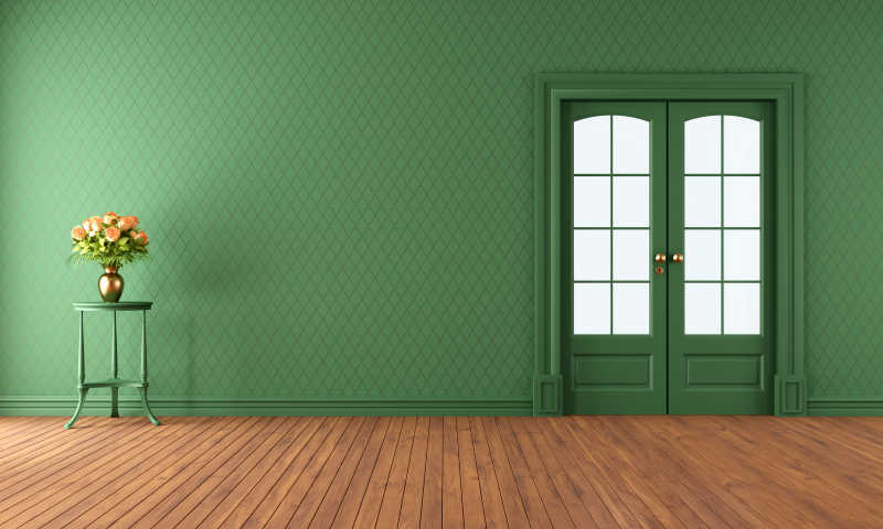 绿色墙壁与绿色关闭的门