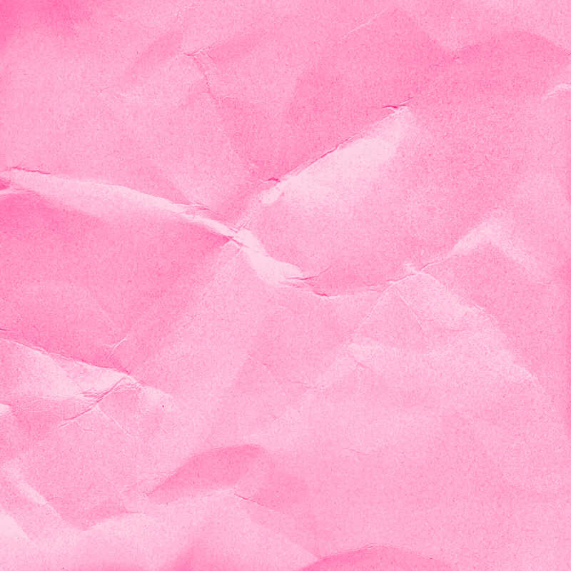 粉红色褶皱纸张纹理背景