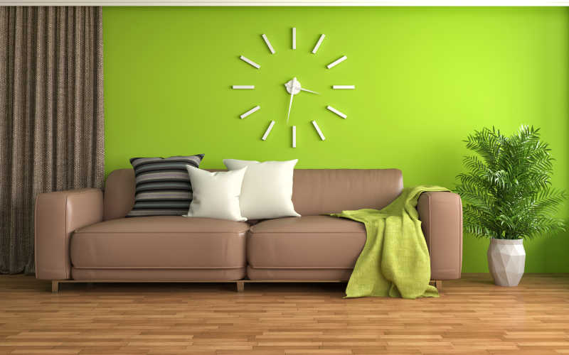 棕色真皮沙发在绿色背景墙下的三维效果