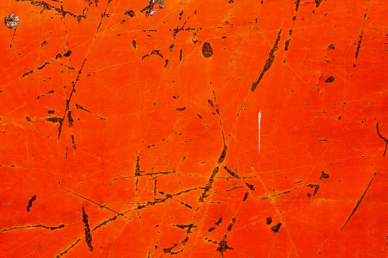 橙色金属表面生锈的纹理背景