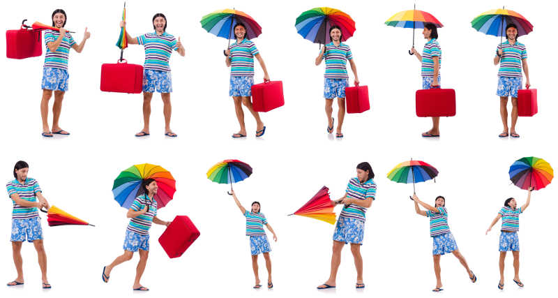 拿着彩色雨伞外出旅游的人