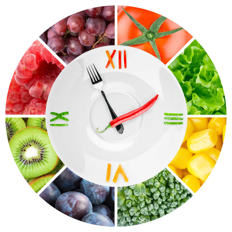 白色背景上的蔬菜食品概念钟
