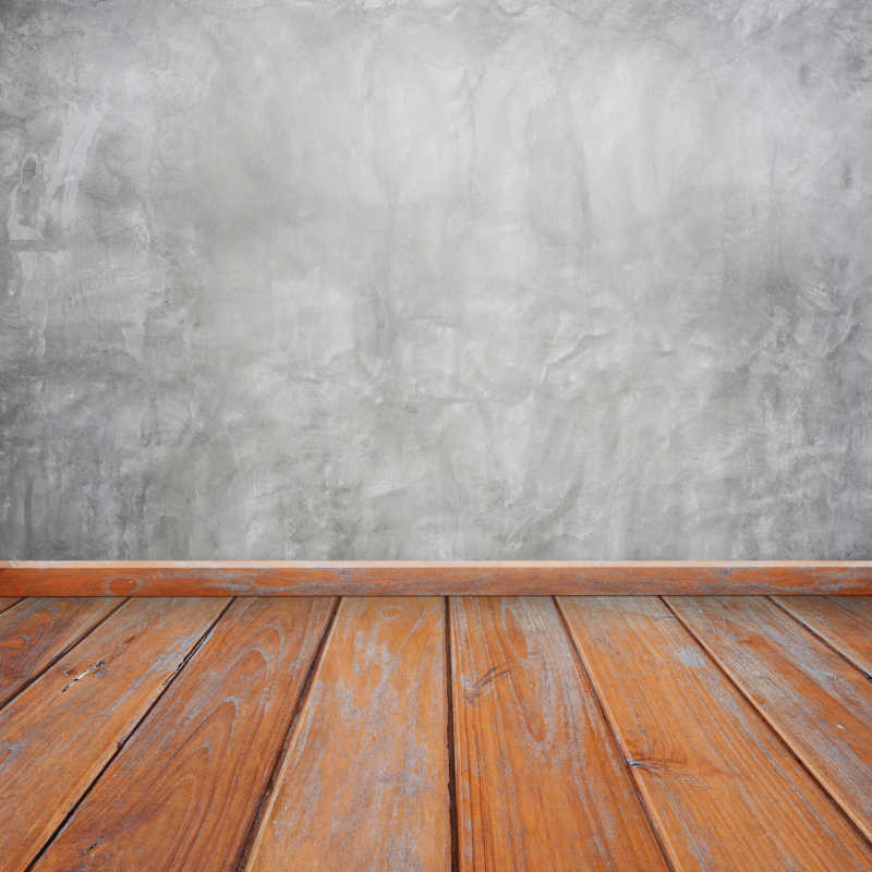 木质地板和灰色的混泥土墙