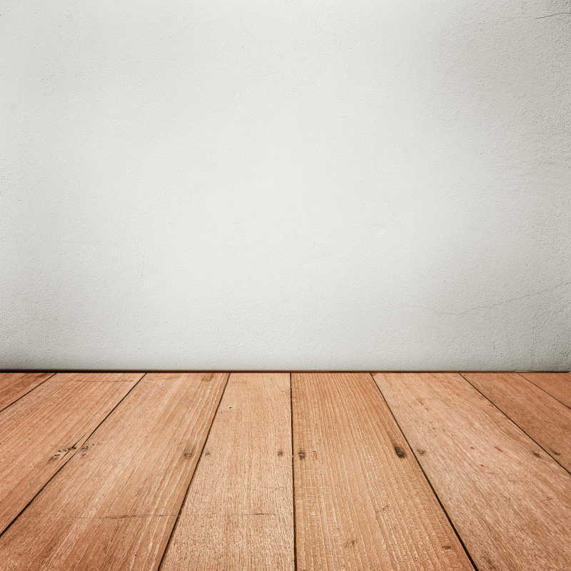 灰色的混泥土砖墙和木地板连接材质背景