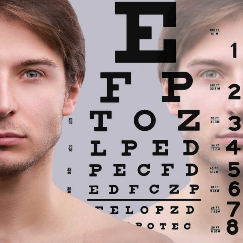 男性面孔的一半和视力表的背景