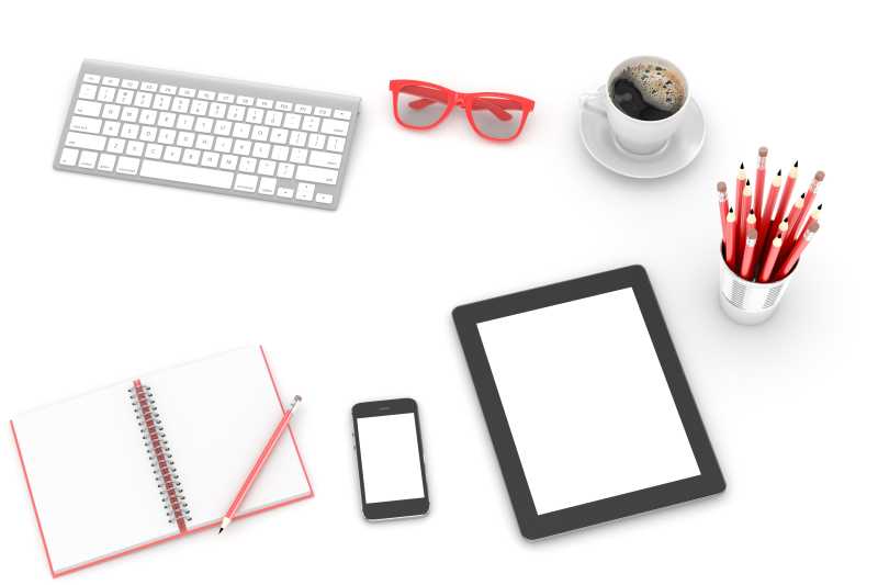白色背景上的ipad智能手机笔筒咖啡杯和键盘等办公用品