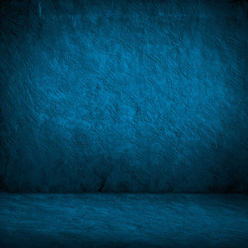 粗糙的蓝色石质墙面背景