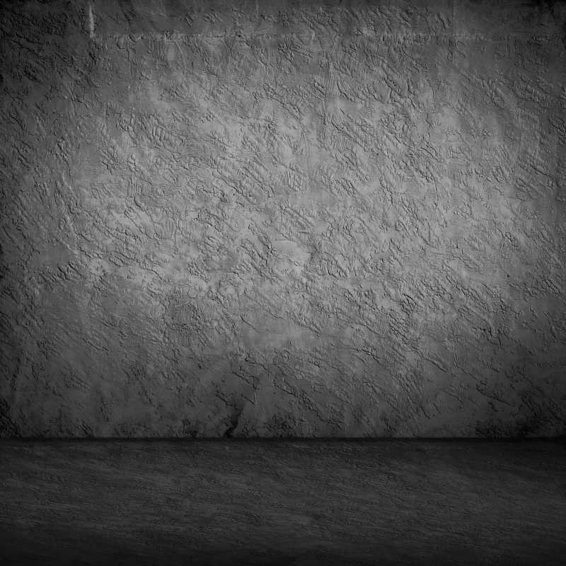 粗糙的灰色石质墙面背景