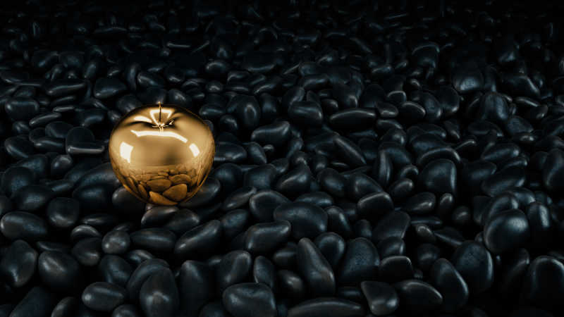 黑色石头上的黄金苹果