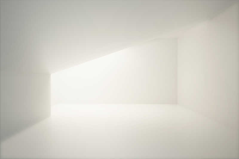 灯光照亮有白色墙壁的房间