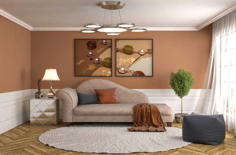 客厅内墙上的装饰画与灰色的沙发地毯和绿植