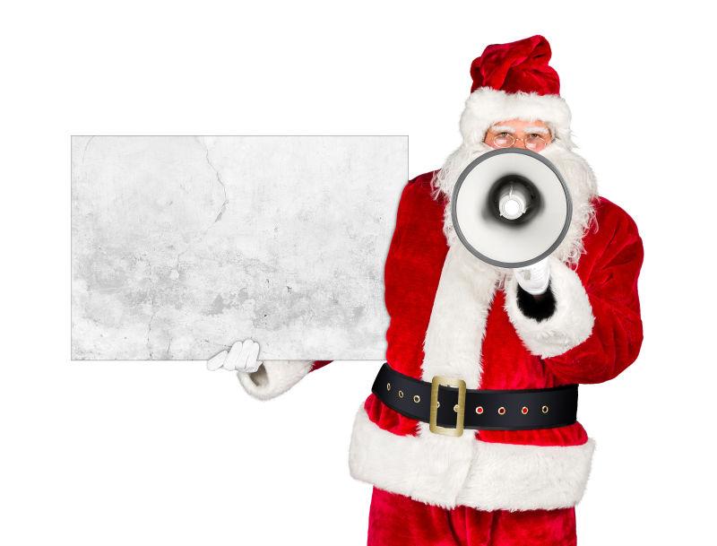 白色背景下拿着扩音器的圣诞老人手里的广告牌