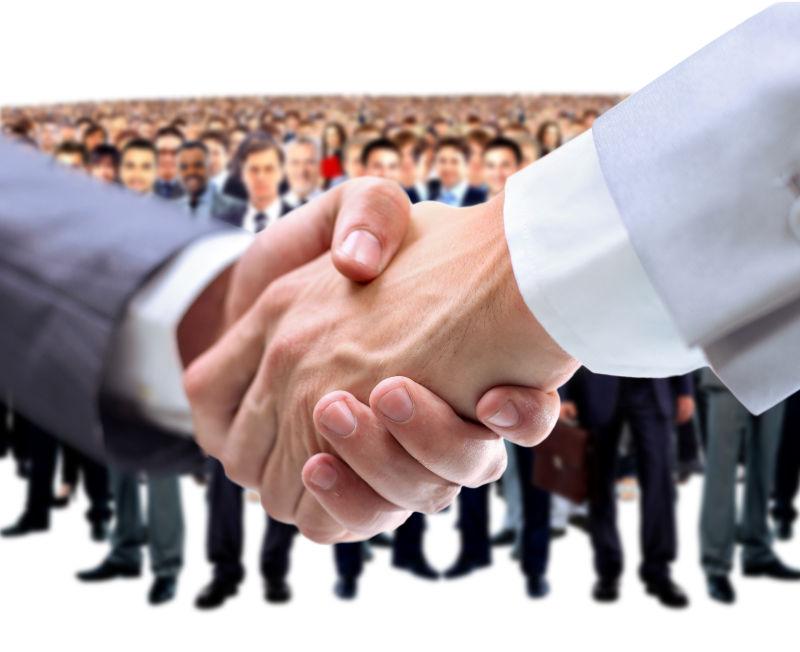 握手与商业人士团队