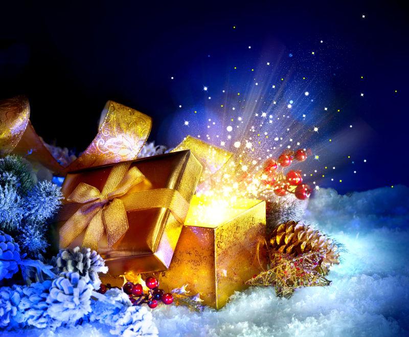 圣诞礼物盒里的魔法星与光
