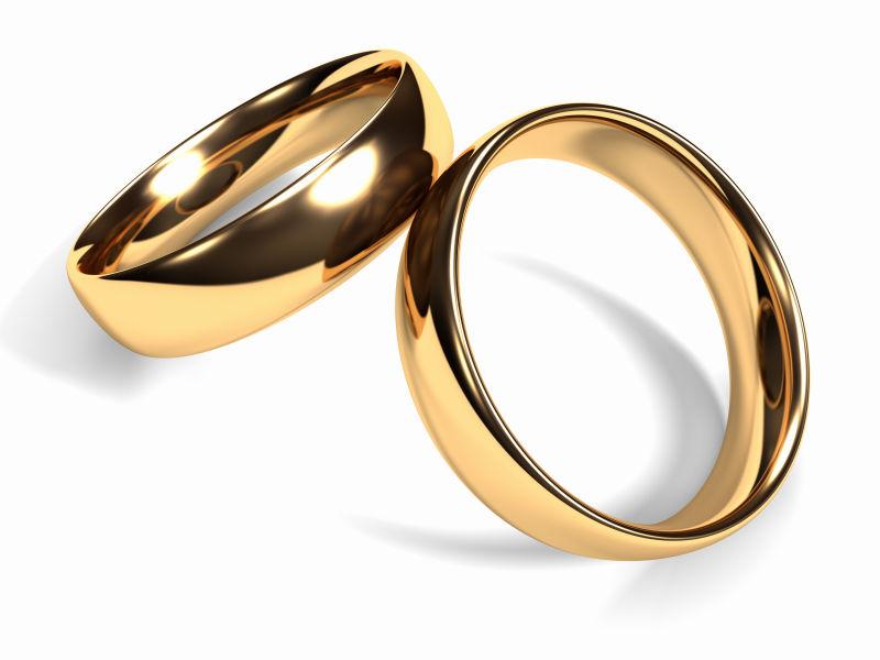 两个黄金结婚戒指在一起