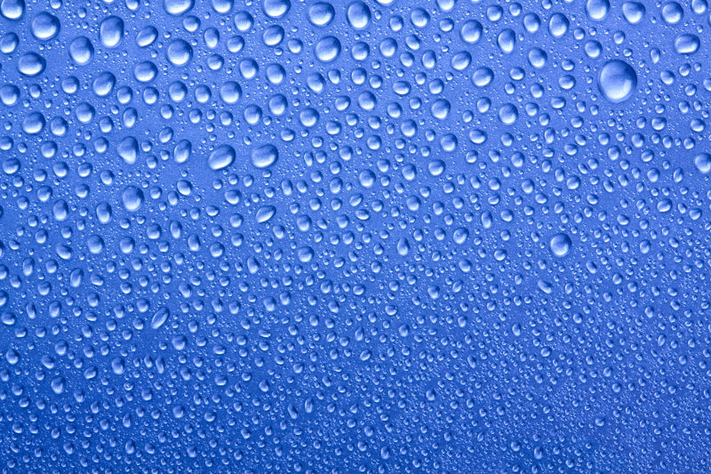 蓝色玻璃上的水滴纹理