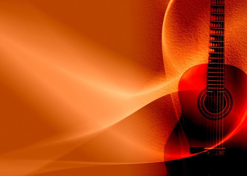 橘黄色背景下的红色吉他