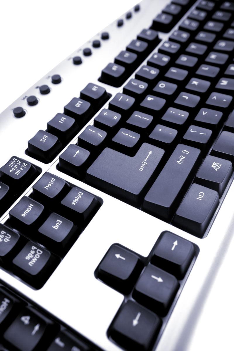 计算机白底黑色按键键盘特写