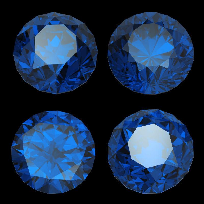 黑色背景下的四颗海蓝宝石