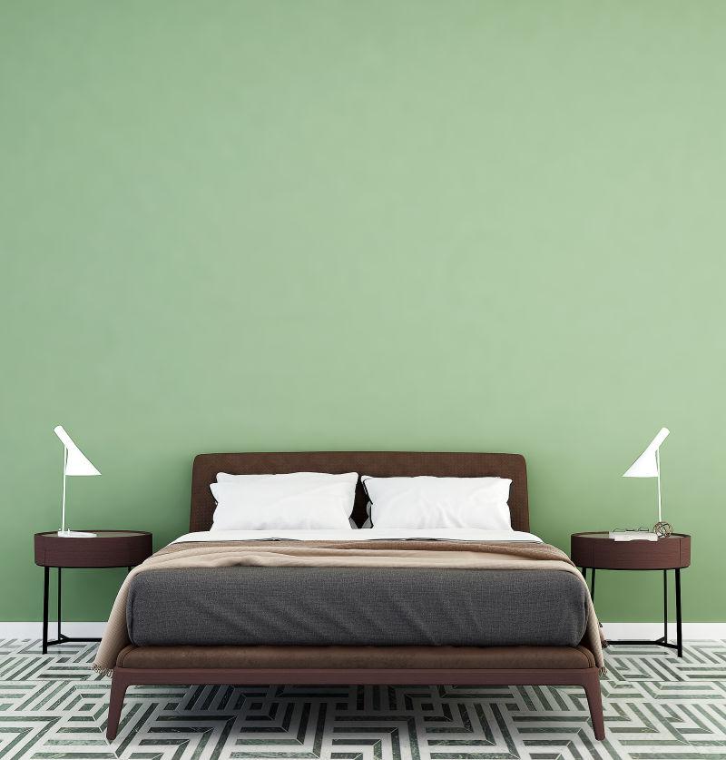 卧室里的绿色墙和床