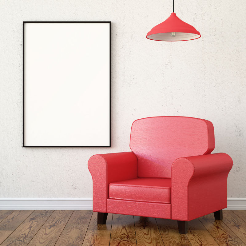 地板上的红色扶手椅和白色墙壁上的空白画框
