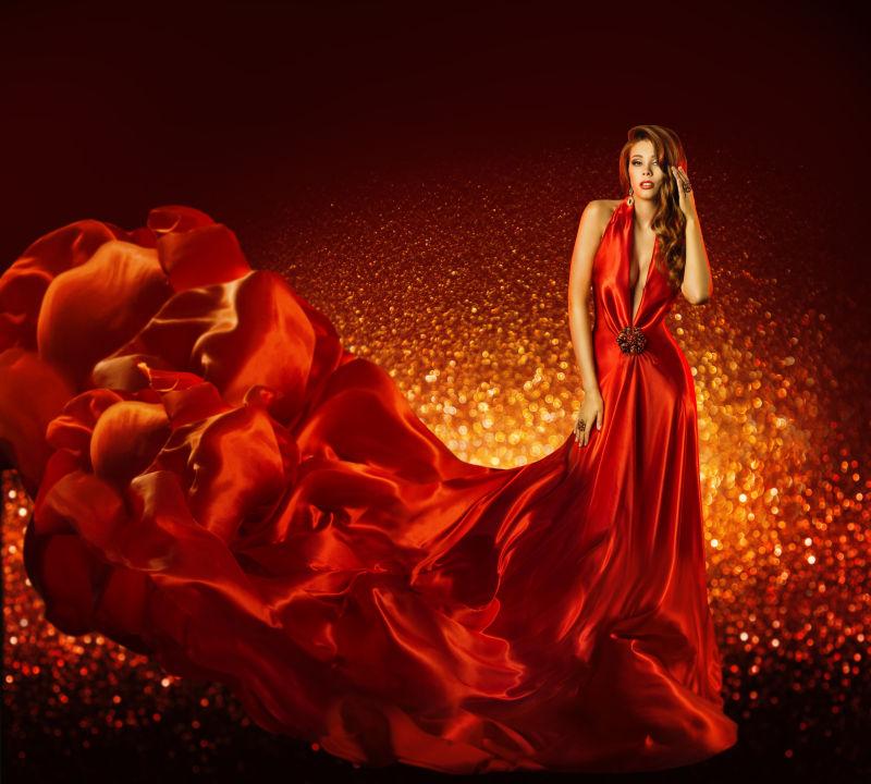 时装女郎身穿红色连衣裙
