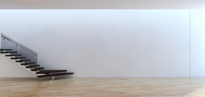白色背景上的现代客厅里的黑色楼梯