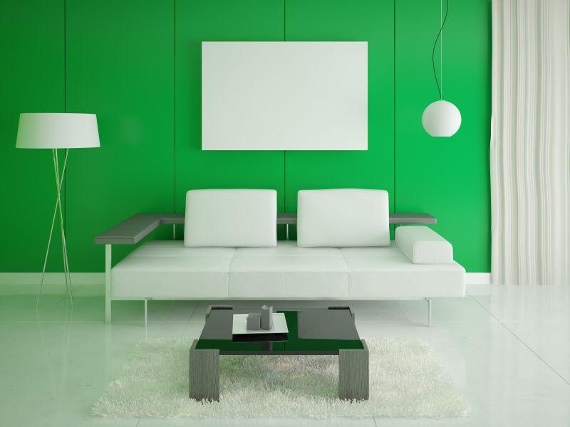 绿色背景中的沙发和茶几