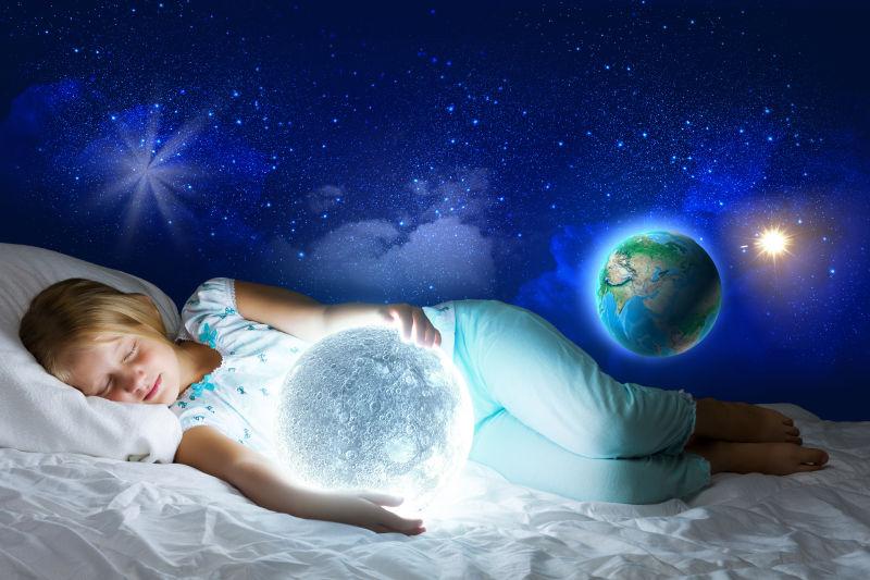 睡觉的小女孩和她的星空梦