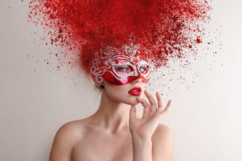 红色抽象发型的时尚女模特