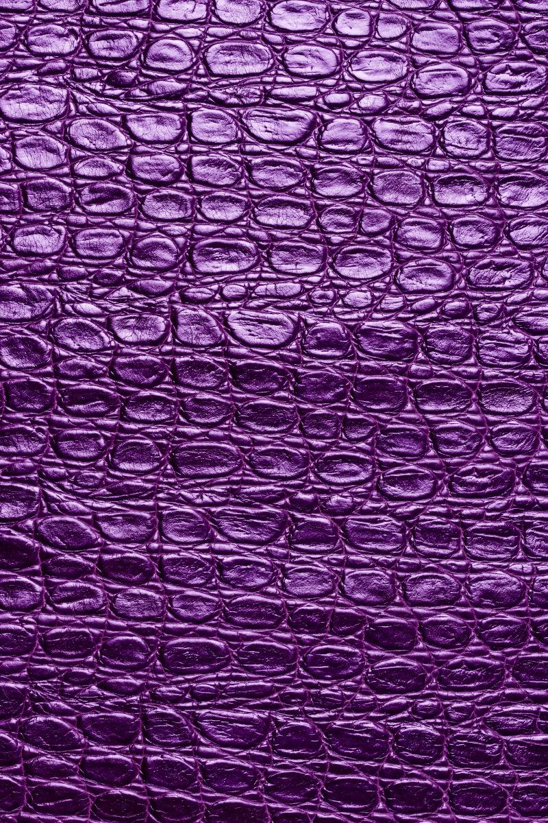 亮紫色的纹理皮革背景