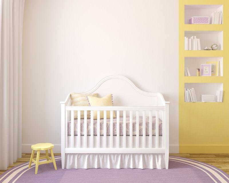 白色的婴儿床黄色柜子