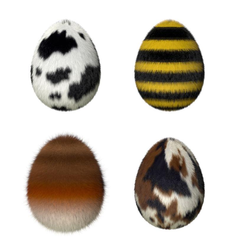 白色背景上毛茸茸的黄色和棕色的复活节彩蛋