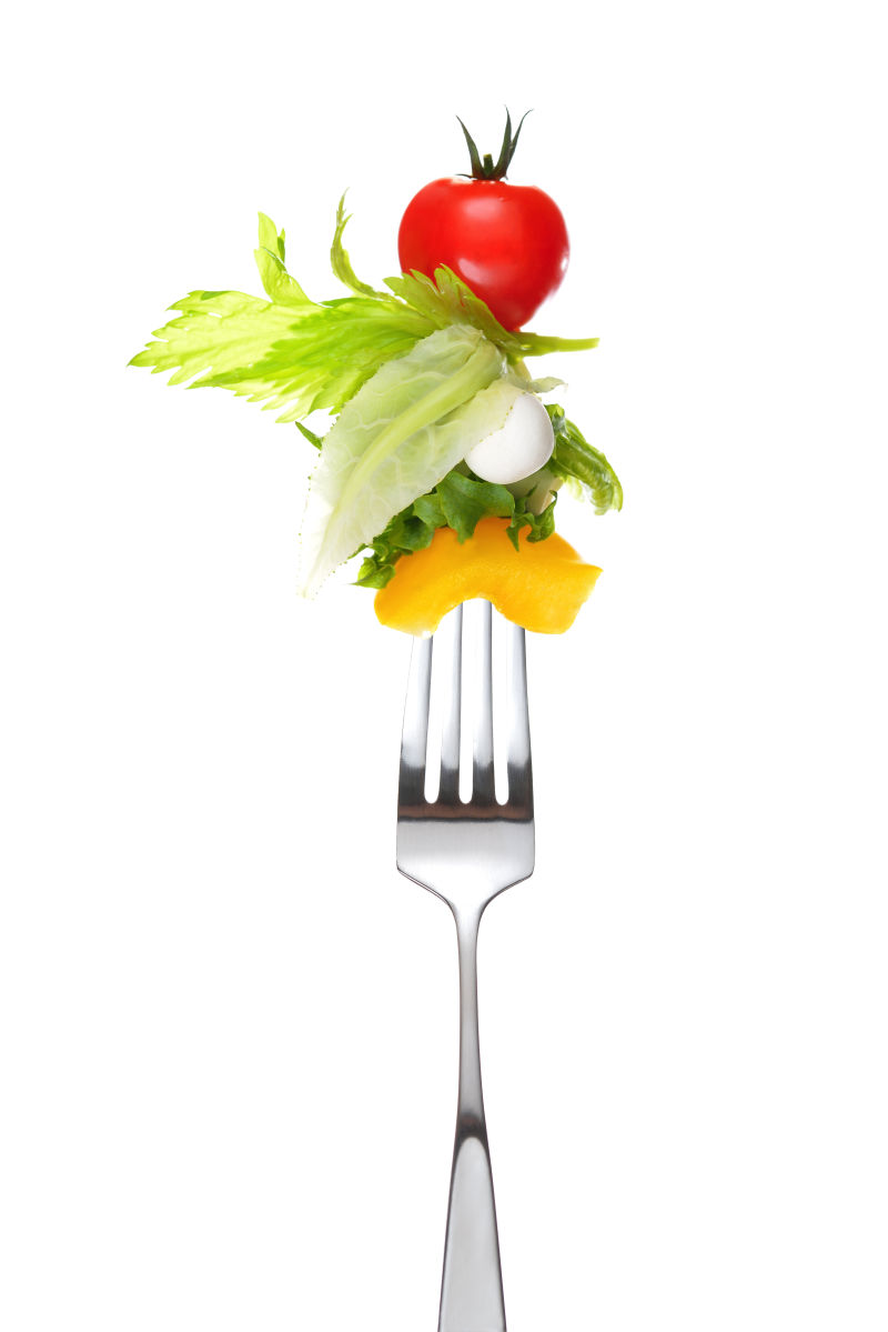 叉子上的蔬菜水果